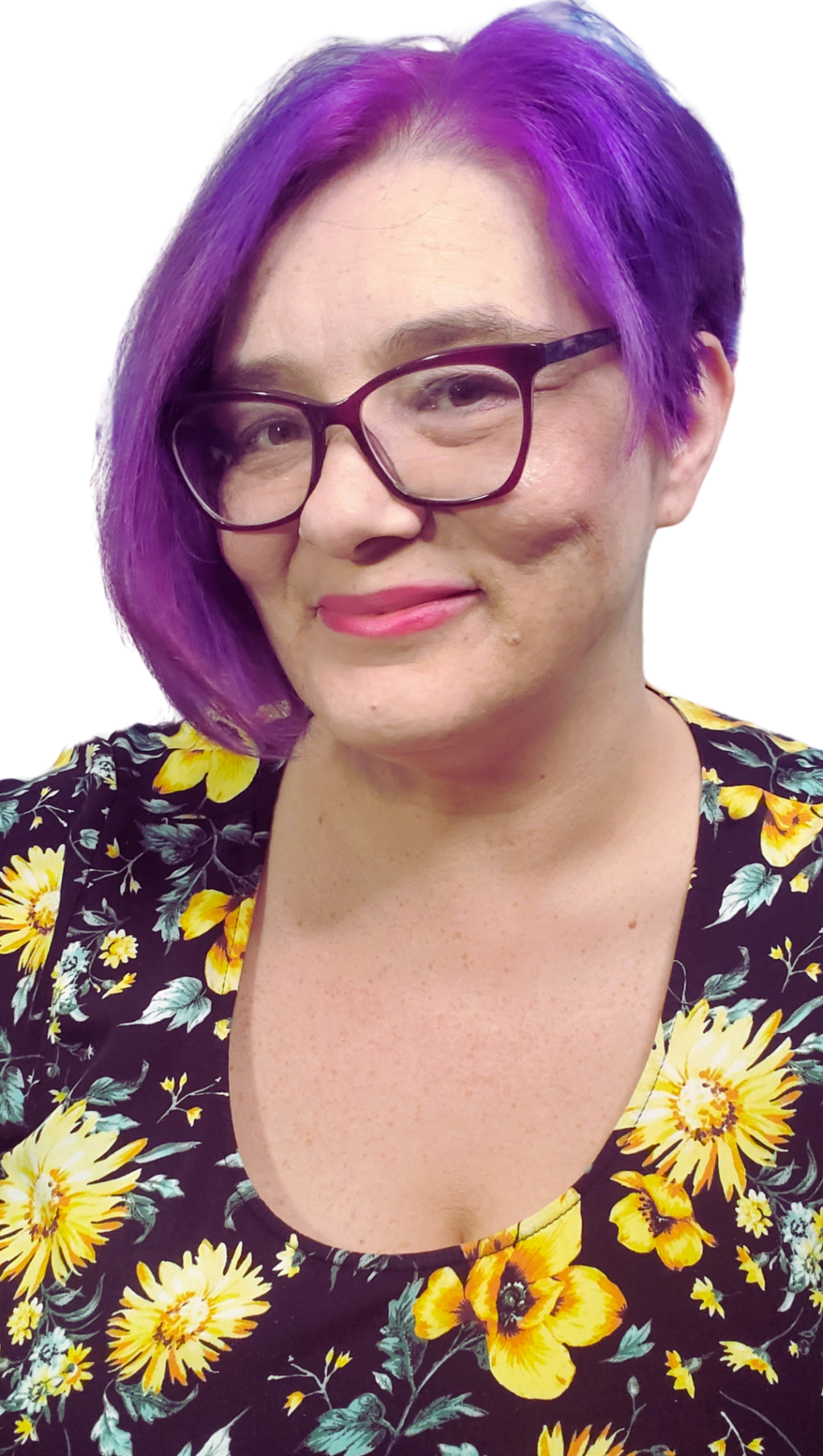 Kat, a woman with purple hair and glasses smiles at the camera